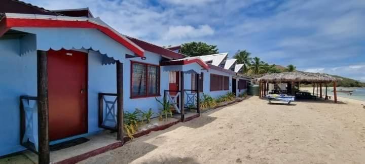 Mana Lagoon Backpackers Villa Bagian luar foto